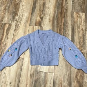 Violet sweater Shein size small. Flower decals. Knitted.